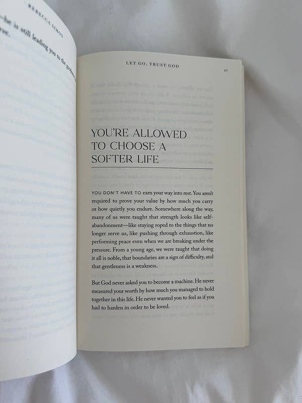 Open book with a quote on a white background