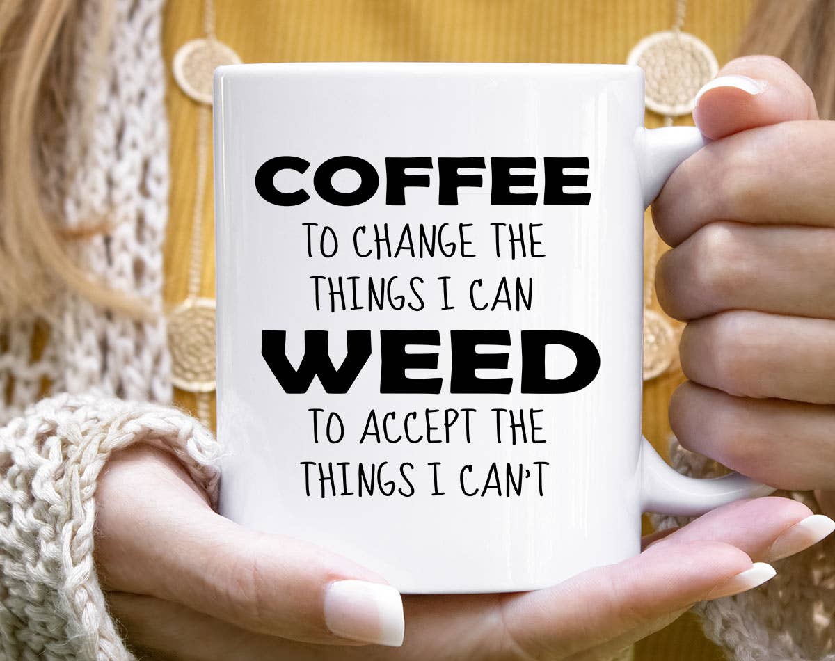 Person holding a mug with humorous text design.