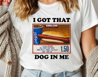 Person wearing a white t-shirt with a humorous graphic and text.