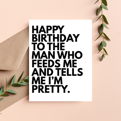Birthday card with humorous message on a beige background with greenery