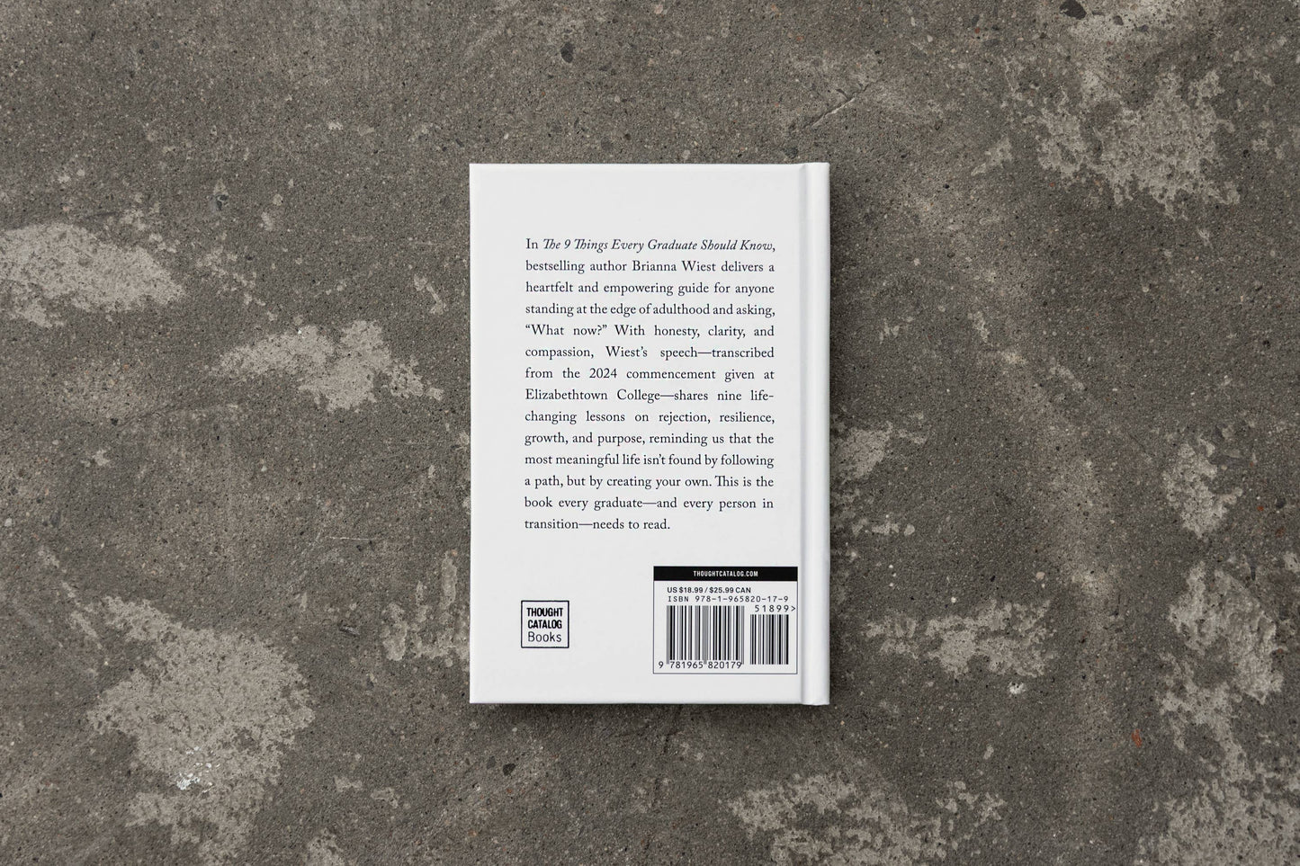 Book back cover on a textured stone surface