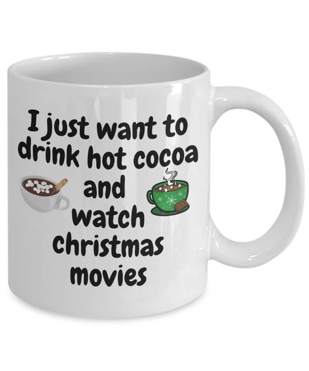 White mug with text 'I just want to drink hot cocoa and watch Christmas movies' and graphics on a white background