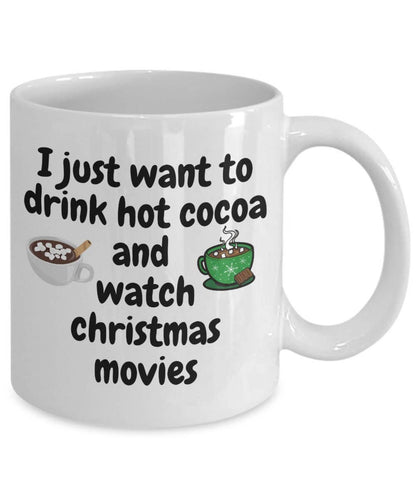 White mug with text 'I just want to drink hot cocoa and watch Christmas movies' and graphics on a white background