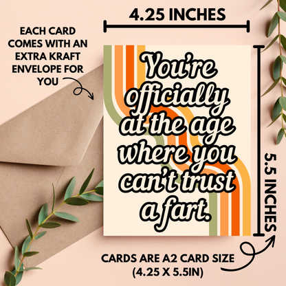 Card with humorous text and dimensions on a beige background with an envelope and leaves.