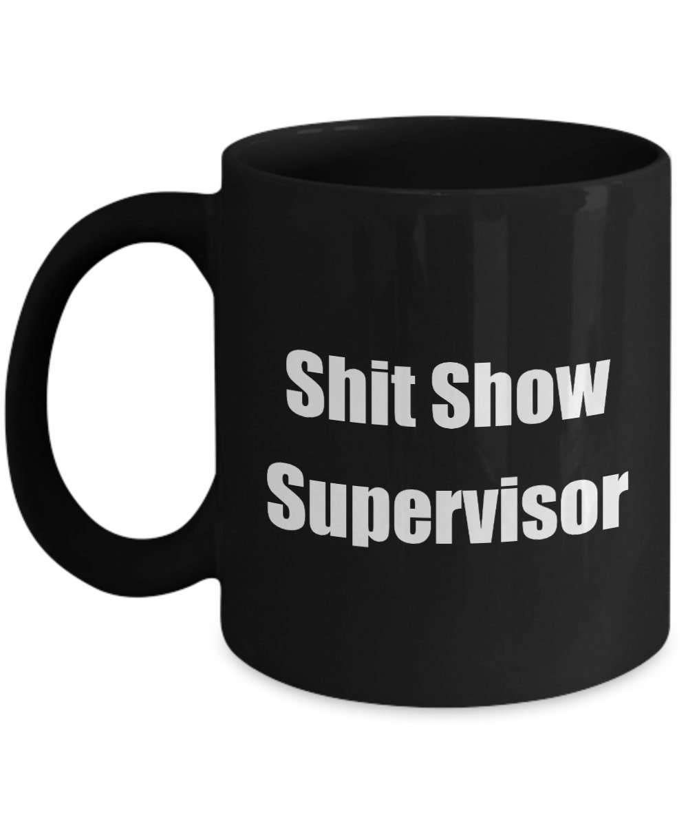 Black mug with 'Shit Show Supervisor' text on a white background